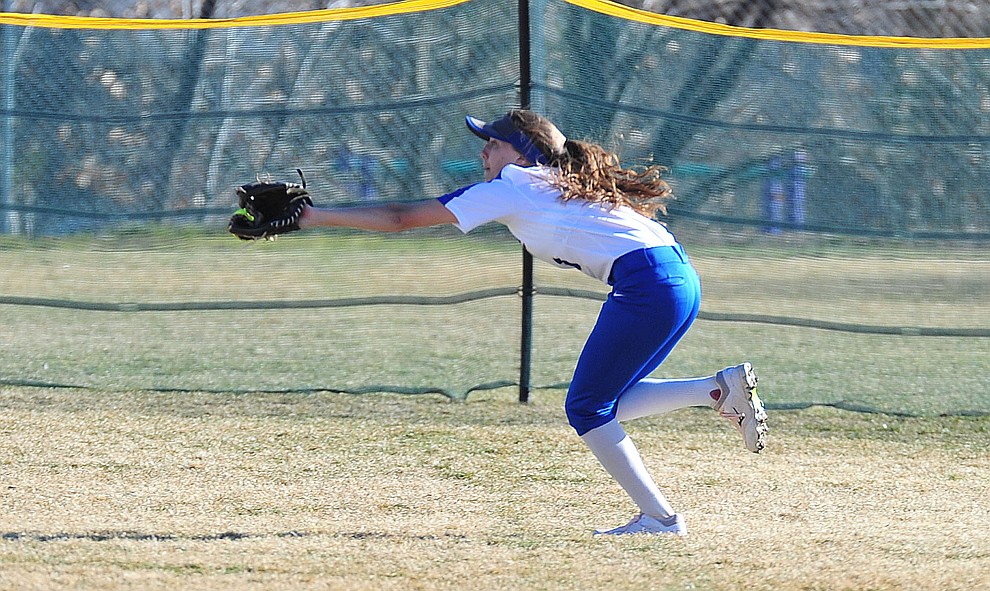 Prescott's Dana Seevey goes for a catch as the Badgers host the Mingus Marauders Tuesday, March 5, 2019 in Prescott. (Les Stukenberg/Courier)