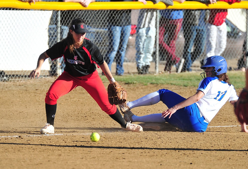 Prescott's Rebekah Norris slides safely into third as the Badgers host the Mingus Marauders Tuesday, March 5, 2019 in Prescott. (Les Stukenberg/Courier)