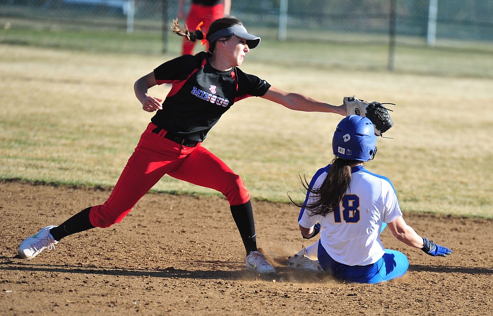 Prescott's Tessa Eppele slides safely into second as the Badgers host the Mingus Marauders Tuesday, March 5, 2019 in Prescott. (Les Stukenberg/Courier)