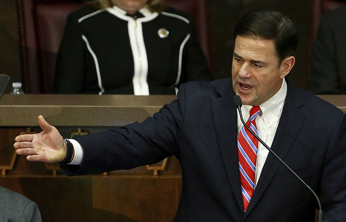 Arizona Gov. Doug Ducey gestures while giving his state of the state address talking about Arizona's economy, new jobs, and the state revenue Monday, Jan. 14, 2019, in Phoenix. (Ross D. Franklin/AP file)