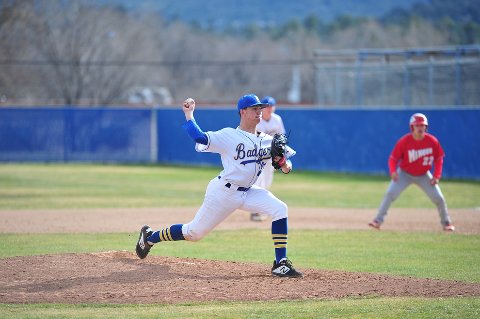 Prescott's JakeSchulz delivers a pitch as the Badgers host the Mingus Marauders Thursday, March 7, 2019 in their home opener for the 2019 season. (Les Stukenberg/Courier)