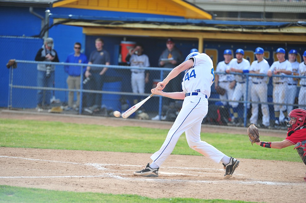 Prescott's Corey Schwartz singles and later scored as the Badgers host the Mingus Marauders Thursday, March 7, 2019 in their home opener for the 2019 season. (Les Stukenberg/Courier)