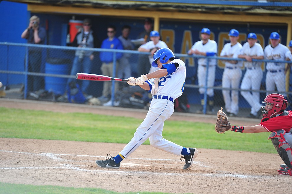 Prescott's Ray Chairez singles as the Badgers host the Mingus Marauders Thursday, March 7, 2019 in their home opener for the 2019 season. (Les Stukenberg/Courier)