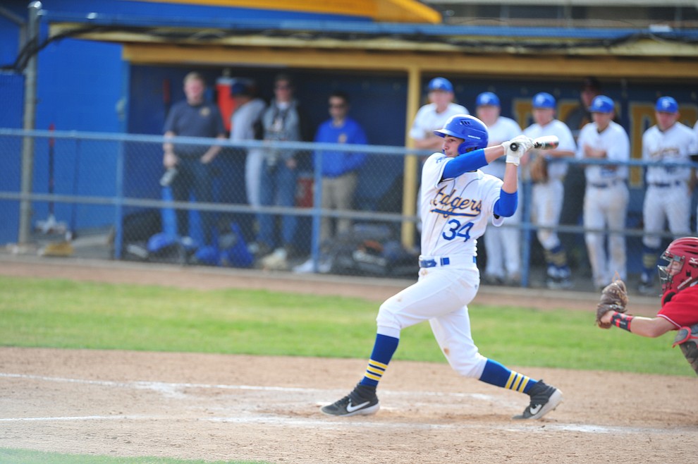 Prescott's Jacob Police singles as the Badgers host the Mingus Marauders Thursday, March 7, 2019 in their home opener for the 2019 season. (Les Stukenberg/Courier)