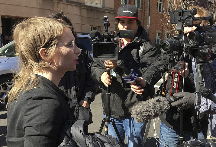 In this Tuesday, March 5, 2019 photo, Chelsea Manning addresses the media outside federal court in Alexandria, Va. The former Army intelligence analyst was ordered to jail Friday, March 8, 2019, for refusing to testify to a Virginia grand jury investigating Wikileaks. (Matthew Barakat/AP)