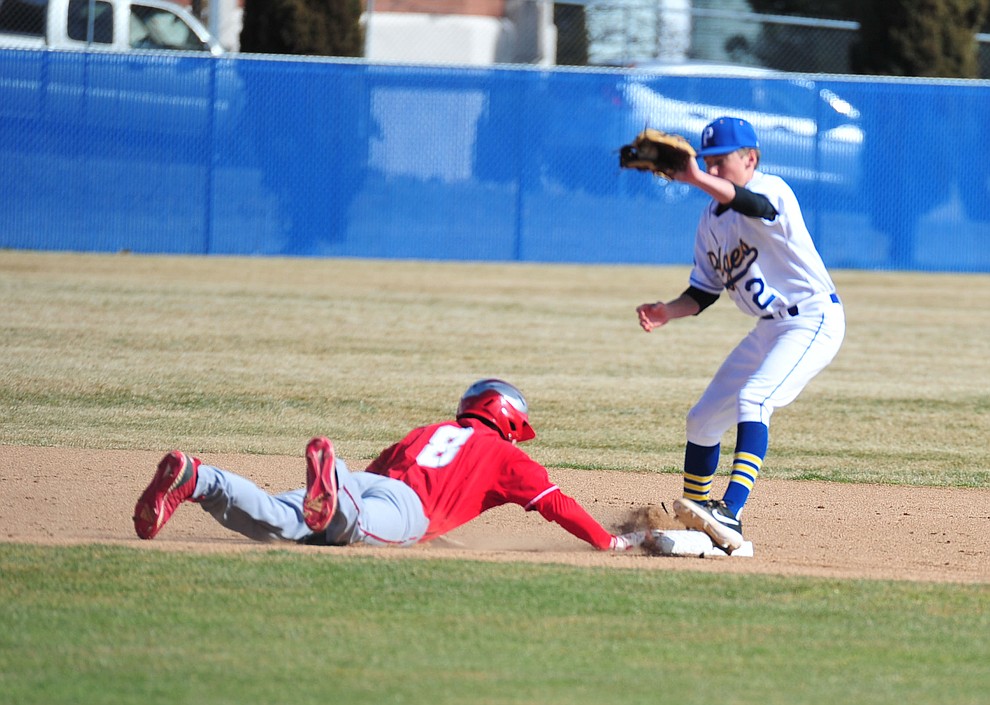 Prescott's Slater Krupnick takes the pickoff attempt throw at second base as the Badgers host the Mingus Marauders Thursday, March 7, 2019 in their home opener for the 2019 season. (Les Stukenberg/Courier)