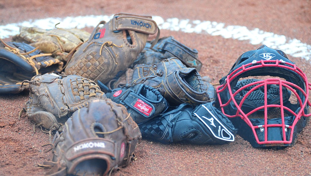 Bradshaw Mountain gloves await their players before the Bears take on Coconino in a steady rainfall, Monday, March 11, 2019, in Prescott Valley. Les Stukenberg/Courier)