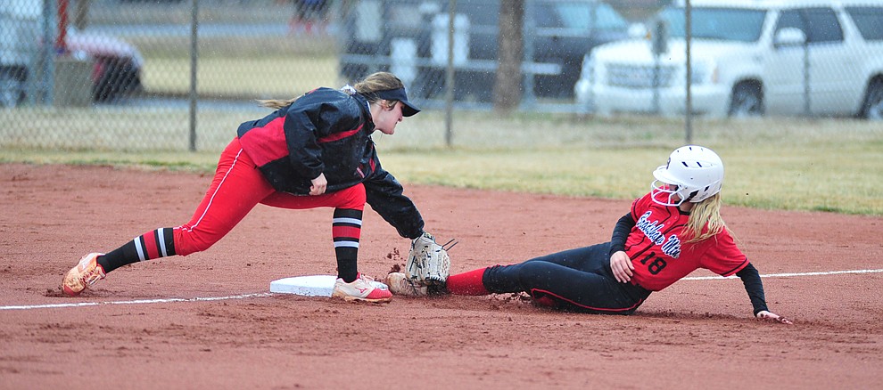 Bradshaw Mountain's Kassidy Outlaw steals third base as the Bears take on Coconino in a steady rainfall, Monday, March 11, 2019, in Prescott Valley. Les Stukenberg/Courier)