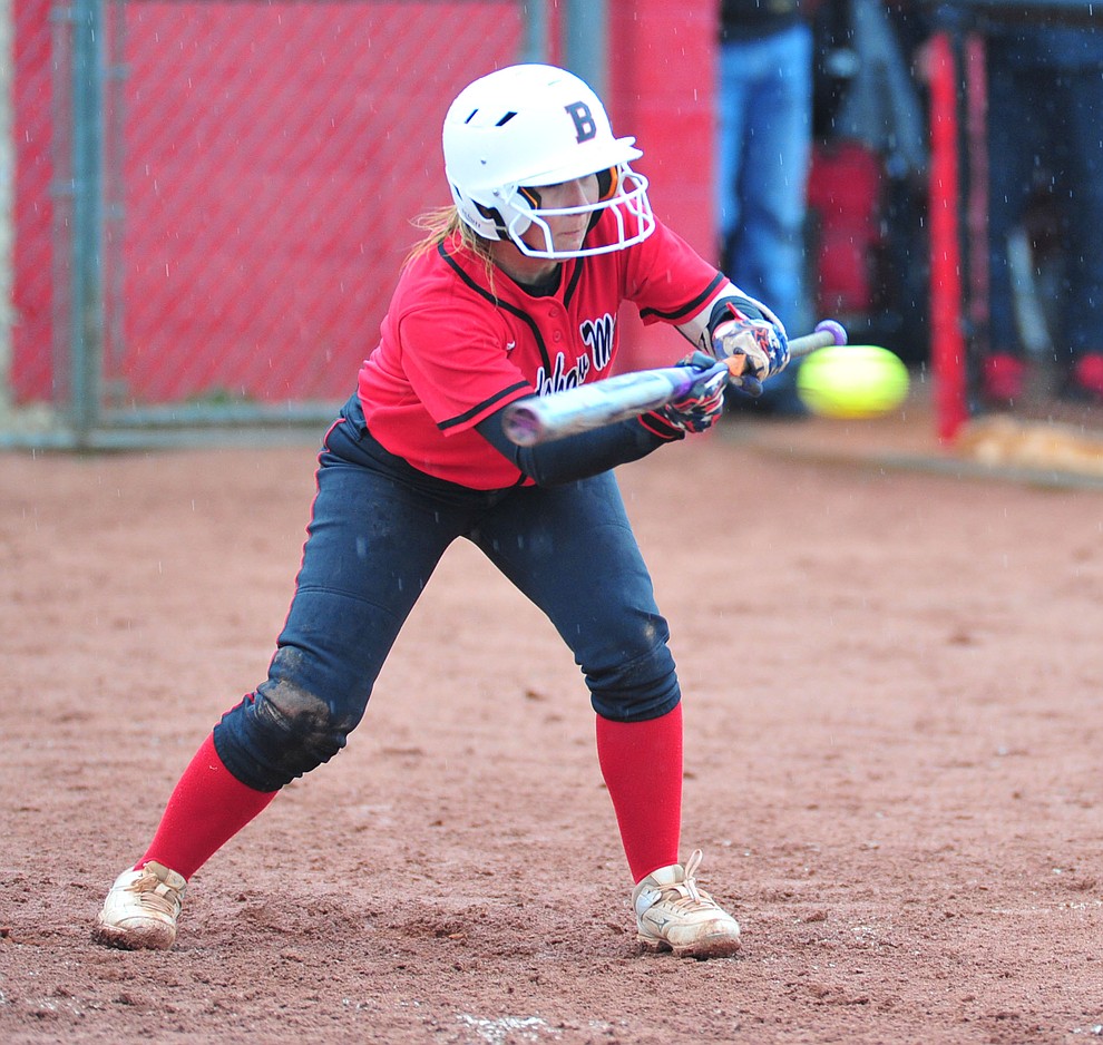 Bradshaw Mountain's Shelby Dilcher tries to lay down a bunt as the Bears take on Coconino in a steady rainfall, Monday, March 11, 2019, in Prescott Valley. Les Stukenberg/Courier)