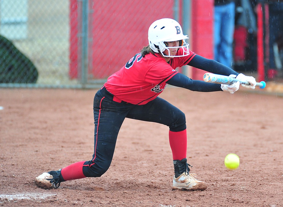 Bradshaw Mountain's Layla Stouder lays down a bunt as the Bears take on Coconino in a steady rainfall, Monday, March 11, 2019, in Prescott Valley. Les Stukenberg/Courier)