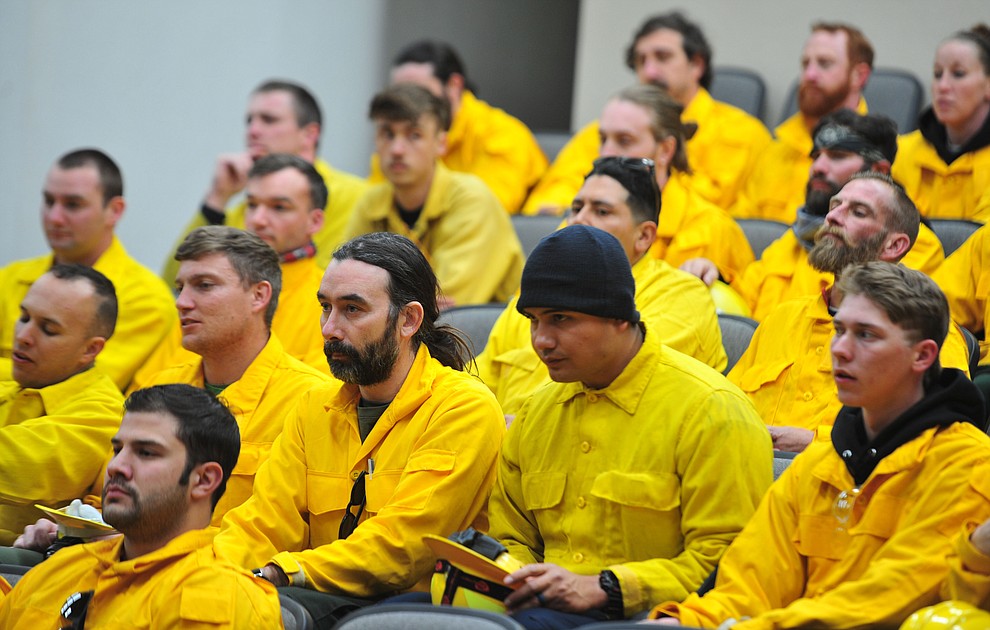 Arizona Wildfire & Incident Management Academy's 92 students in four S130/190 Basic Wildland Firefighting classes prepare to go out on their field day at Embry Riddle Aeronatical University, Wednesday, March 13, 2019, in Prescott. (Les Stukenberg/Courier)