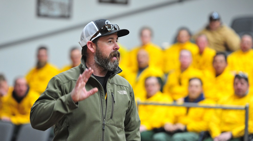Instructor PJ Lingley talks to Arizona Wildfire & Incident Management Academy's 92 students in four S130/190 Basic Wildland Firefighting classes go out on their field day at Embry Riddle Aeronatical University, Wednesday, March 13, 2019, in Prescott. (Les Stukenberg/Courier)