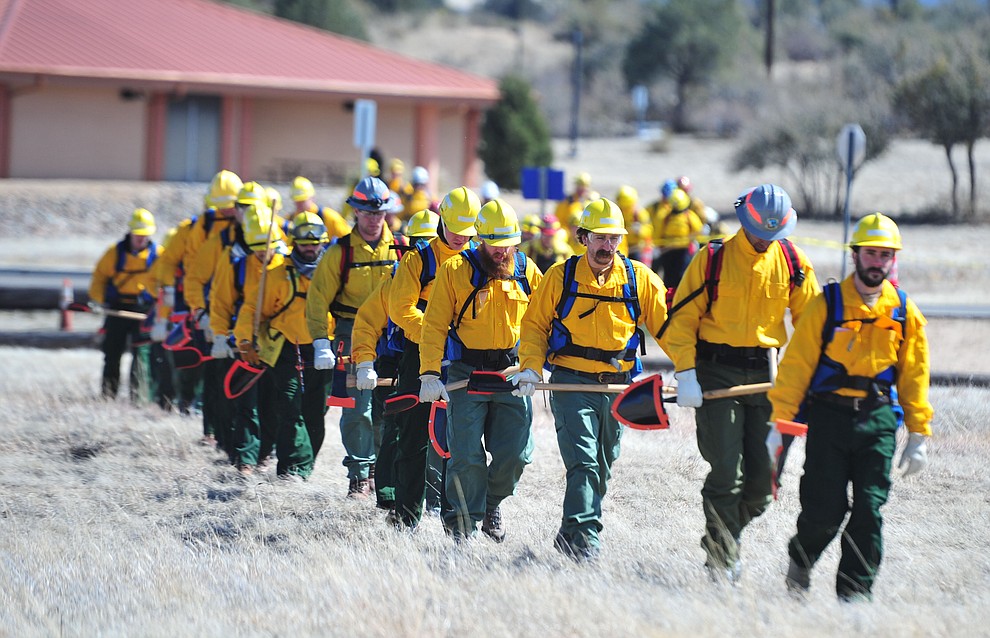 Arizona Wildfire & Incident Management Academy's 92 students in four S130/190 Basic Wildland Firefighting classes go out on their field day at Embry Riddle Aeronatical University, Wednesday, March 13, 2019, in Prescott. (Les Stukenberg/Courier)