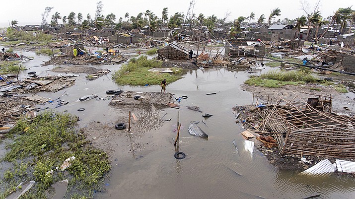 In this photo taken on Friday, March 15, 2019 and provided by the International Red Cross, an aerial view of the destruction of homes after Tropical Cyclone Idai, in Beira, Mozambique. Mozambique's President Filipe Nyusi says that more than 1,000 may have by killed by Cyclone Idai, which many say is the worst in more than 20 years. (Denis Onyodi/IFRC via AP)