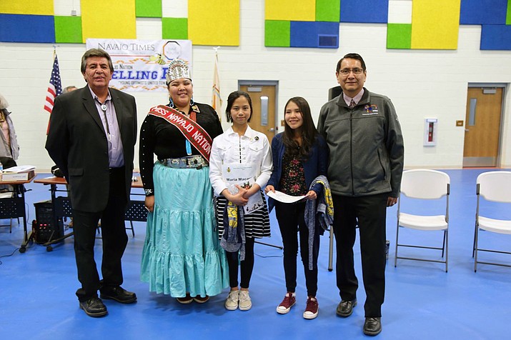 Navajo Nation Spelling Bee winners Kelly Haven (right) and runner-up Maria Lucella Macaraig (left) pose for a photo at the conclusion of their competition with Navajo Nation President Jonathan Nez and Miss Navajo Autumn Montoya March 14, 2019, and Tom Arviso (left), CEO of Navajo Times in Fort Defiance, Arizona. (Navajo Nation Office of the President)