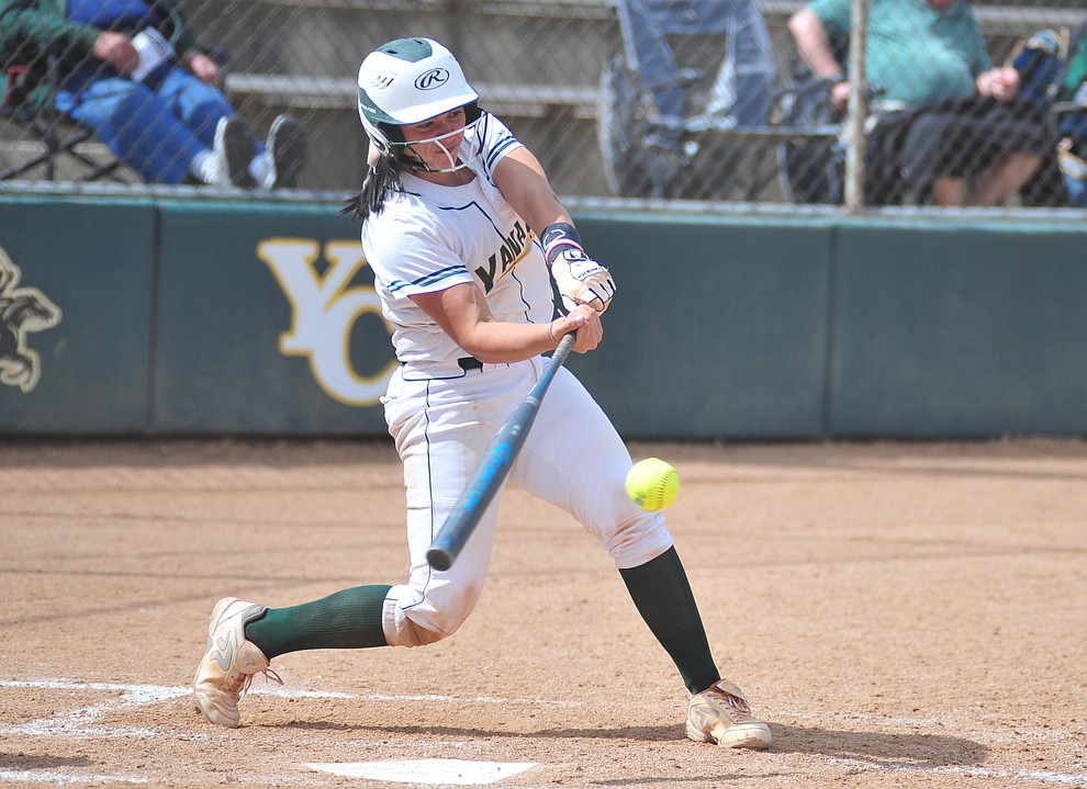 Yavapai's Kylie Brown strokes the walk-off two run homer in the bottom of the seventh inning as the Roughriders take on the Chandler Gilbert Coyotes Tuesday, March 19, 2018 in Prescott.