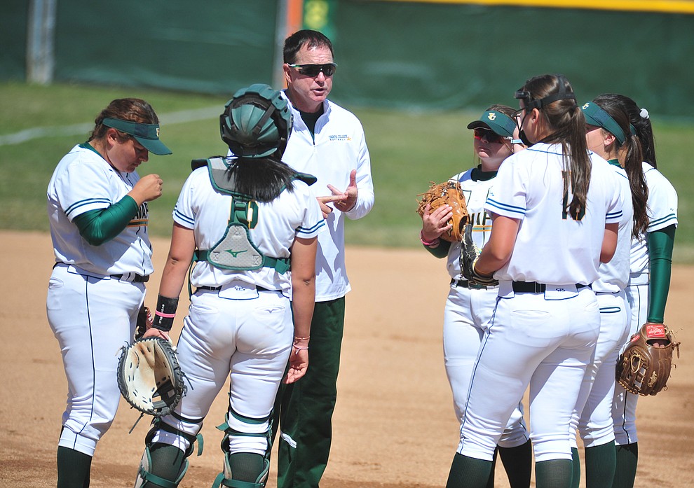 Yavapai Head Coach Doug Eastman talks to his players as the Roughriders take on the Chandler Gilbert Coyotes Tuesday, March 19, 2018 in Prescott.