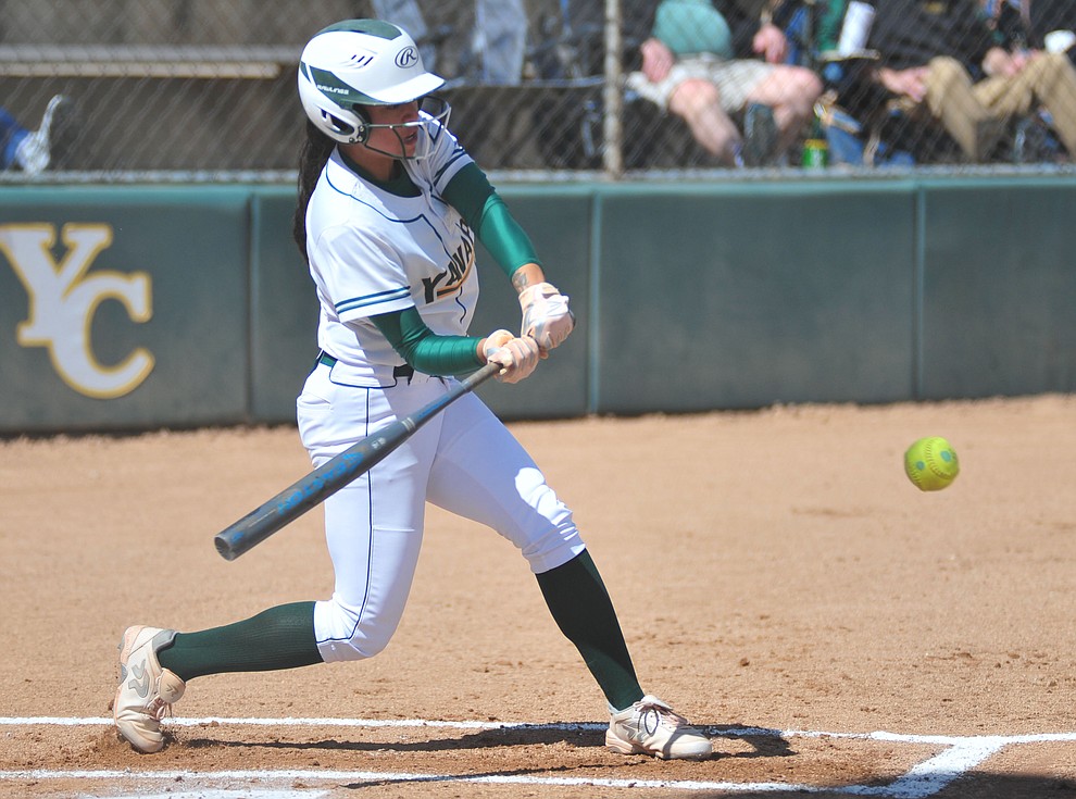 Yavapai's Neenah Pangilinan strokes a single as the Roughriders take on the Chandler Gilbert Coyotes Tuesday, March 19, 2018 in Prescott.