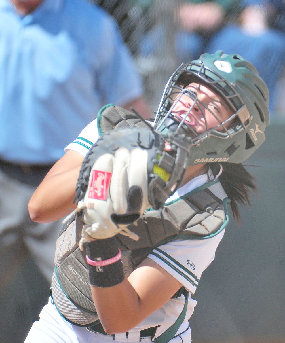 Yavapai's Kylie Brown makes the catch on a foul ball as the Roughriders take on the Chandler Gilbert Coyotes Tuesday, March 19, 2018 in Prescott.