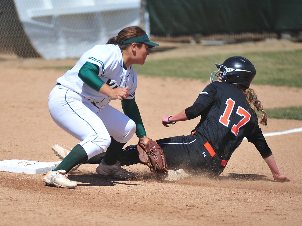 Yavapai's Alexus Garza tries to make the tag at third as the Roughriders take on the Chandler Gilbert Coyotes Tuesday, March 19, 2018 in Prescott.