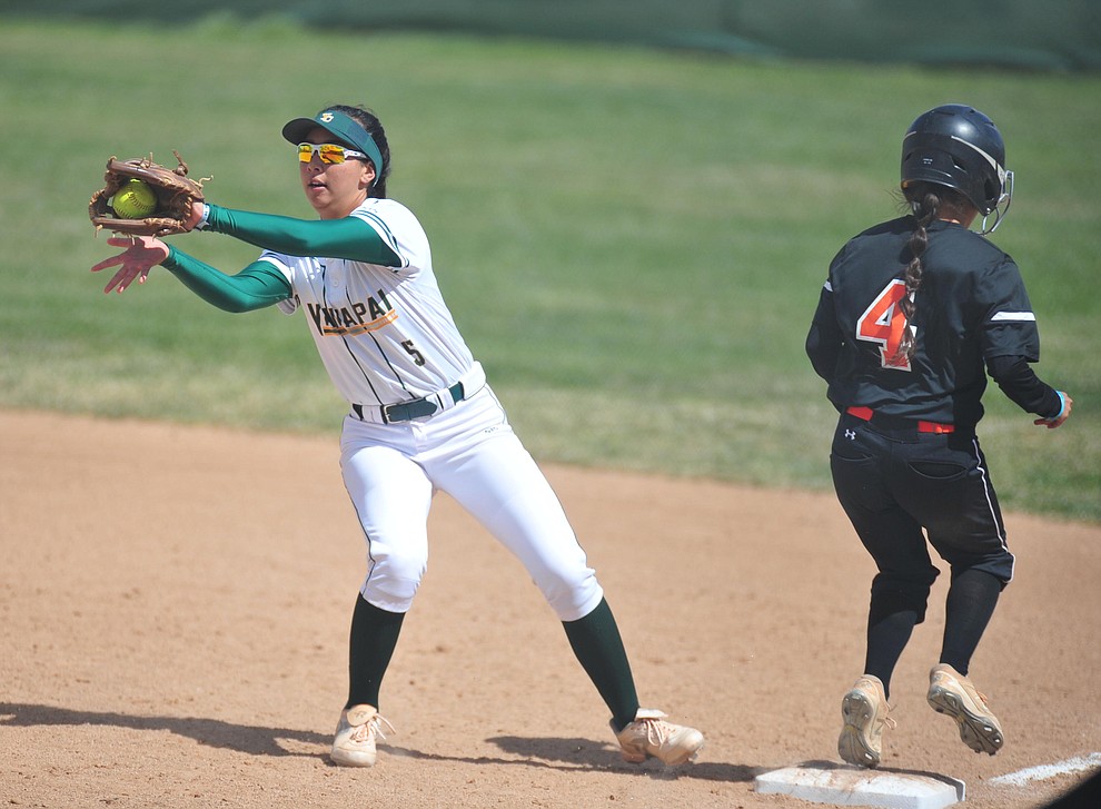 Yavapai's Shaylee Alani tries to make the play at first as the Roughriders take on the Chandler Gilbert Coyotes Tuesday, March 19, 2018 in Prescott.