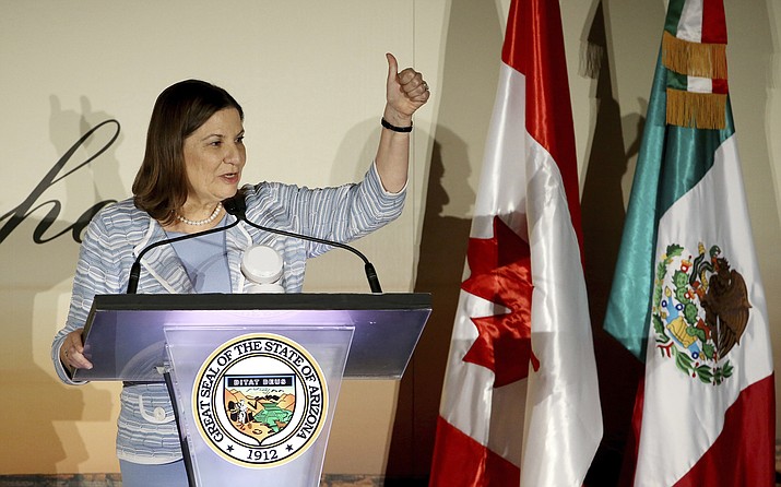 Ambassador of Mexico to the U.S., Martha Barcena, gives a thumbs-up at the 2019 Arizona-Mexico Commission Governor's Luncheon, as she speaks in front of Arizona Gov. Doug Ducey Tuesday, March 19, 2019, in Phoenix. (Ross D. Franklin/AP)