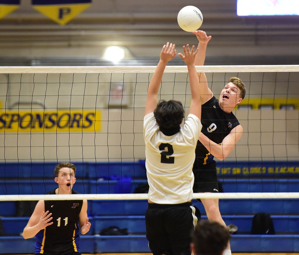 Prescott's Harris Temple sends a kill down as the Badgers hosted Leading Edge Wednesday, March 20, 2019 in Prescott. (Les Stukenberg/Courier)