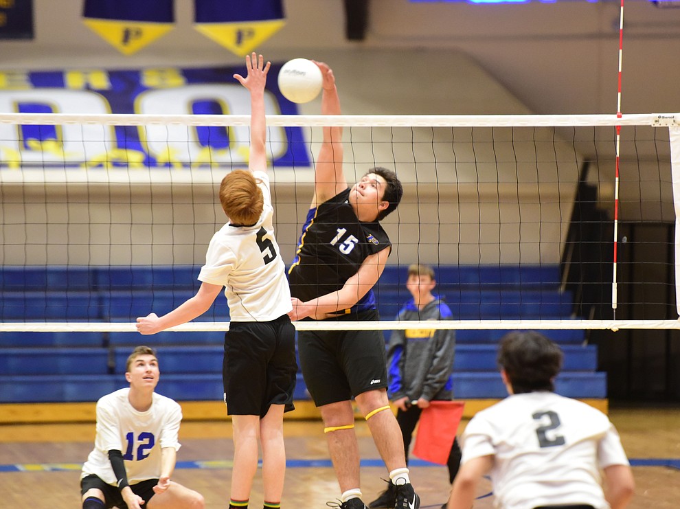 Prescott's Robert Oldfield goes for a kill as the Badgers hosted Leading Edge Wednesday, March 20, 2019 in Prescott. (Les Stukenberg/Courier)