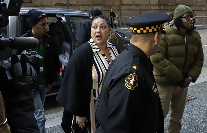 Michelle Kenney, center, the mother of Antwon Rose II, arrives at the Allegheny County Courthouse with supporters on the second day of the trial for Michael Rosfeld, a former police officer in East Pittsburgh, Pa., Wednesday, March 20, 2019. Rosfeld is charged with homicide in the fatal shooting of Antwon Rose II as he fled during a traffic stop on June 19, 2018. (Gene J. Puskar/AP)