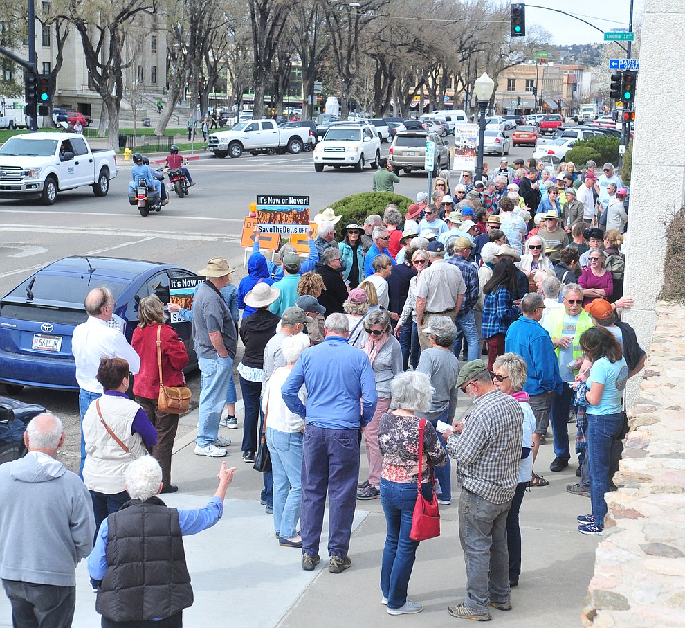 Several hundred Save the Dells supporters gather outside Prescott City Hall to show their support against the planned Arizona Eco Development and annexation of some of the Granite Dells area Tuesday, March 26 in Prescott. (Les Stukenberg/Courier)
