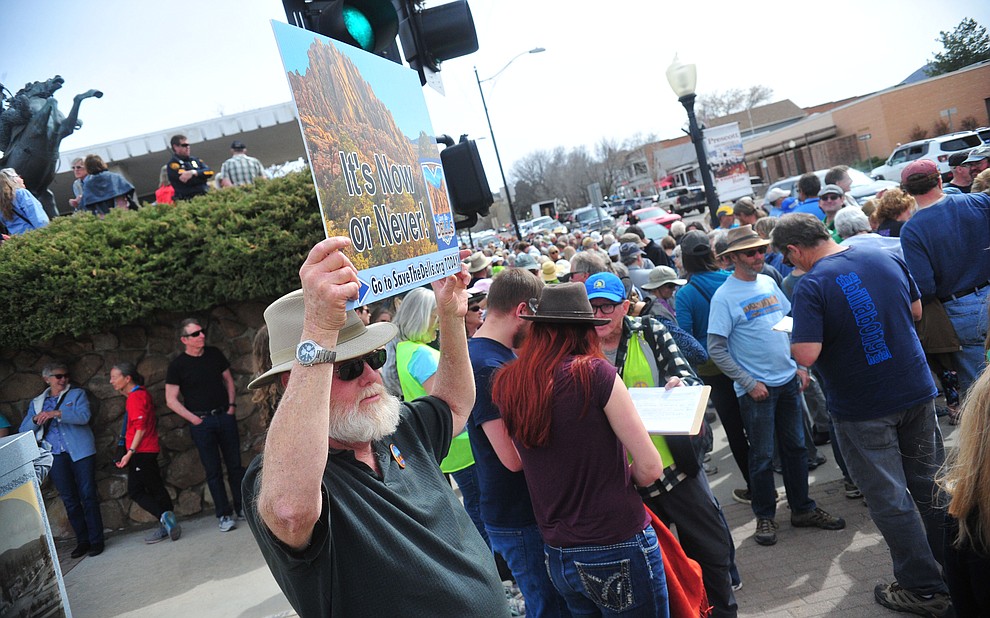 Several hundred Save the Dells supporters gather outside Prescott City Hall to show their support against the planned Arizona Eco Development and annexation of some of the Granite Dells area Tuesday, March 26 in Prescott. (Les Stukenberg/Courier)