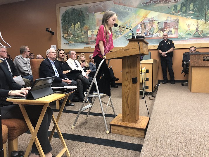 Prescott third-grader Suli Sherman speaks to the Prescott City Council on Tuesday, March 26, in support of the Save the Dells organization’s position on open space in the Granite Dells. (Cindy Barks/Courier)