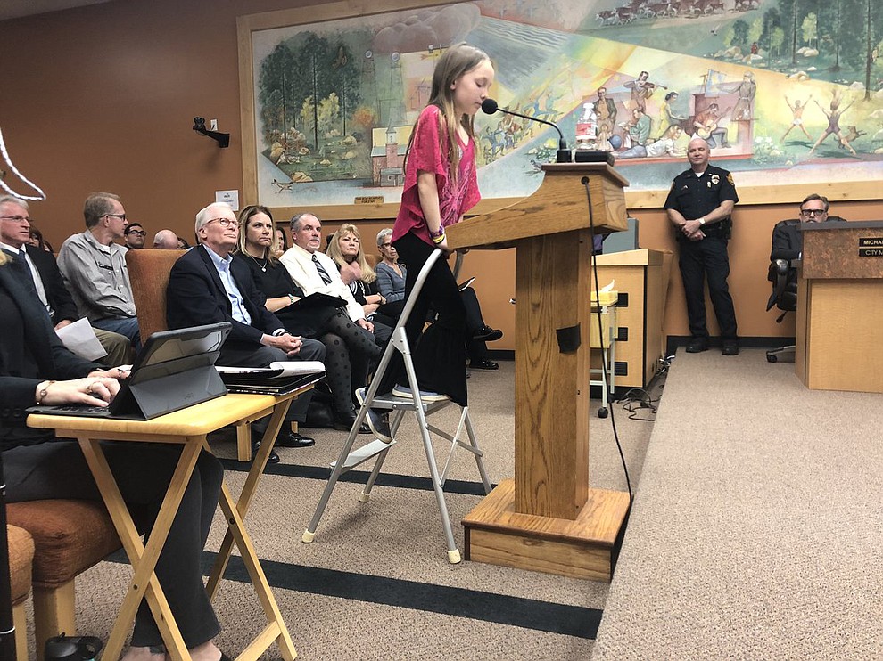 Third-grader Suli Sherman tells #PrescottCityCouncil that a survey she did shows that most locals & visitors support preserving the #GraniteDells at #PointofRocks. (Cindy Barks/Courier)