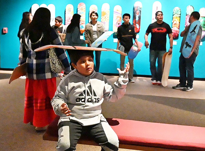 Ellis-Ray Uqualla  learning balance at the Museum of Northern Arizona March 21 at the Pivot exhibit. Uqualla and other Havasupai and Yavapai-Apache students attended an 'Expressions of Hope art workshop' to learn about the healing process of art and creative expression. (Photo/Museum of Northern Arizona)