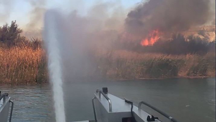 This photo was taken from the San Bernardino County Fire boat as it protected the area near Contact Point on Lake Havasu. (San Bernardino County Fire photo)