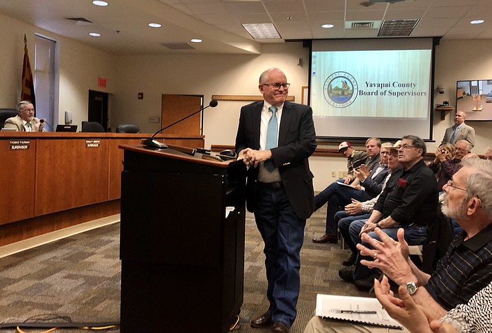 The crowd applauds Wednesday morning, April 3, after longtime Arizona state Sen. Steve Pierce is chosen by the Yavapai County Board of Supervisors to fill the House of Representatives seat vacated last week by David Stringer’s resignation. (Cindy Barks/Courier)
