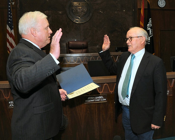 Supreme Court Justice Robert Brutinel, left, swears in Republican Steve Pierce on Wednesday to replace former Rep. David Stringer of Prescott who resigned last week following the release of a police report detailing 1983 charges of paying teen boys for sex. (Howard Fischer/Captiol Media Services)