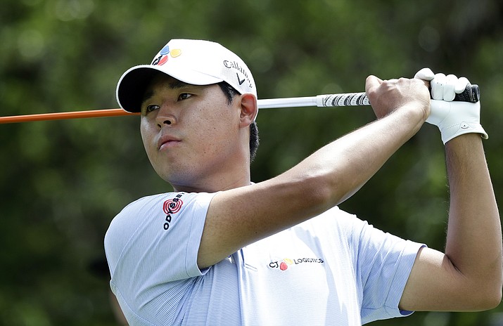 Si Woo Kim watches his drive on the ninth hole during the first round of the Texas Open golf tournament, Thursday, April 4, 2019, in San Antonio. (Eric Gay/AP)