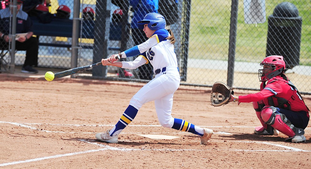 Embry Riddle's Carly Carlsen makes contact as the Eagles take on the University of Antelope Valley Pioneer's for the first game of a softball doubleheader in Prescott Friday, April 5. The Eagles won the game 2-0. (Les Stukenberg/Courier)