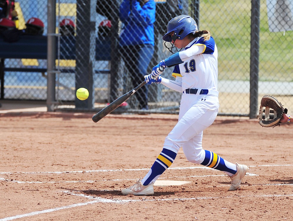 Embry Riddle's Carly Carlsen makes contact as the Eagles take on the University of Antelope Valley Pioneer's for the first game of a softball doubleheader in Prescott Friday, April 5. The Eagles won the game 2-0. (Les Stukenberg/Courier)