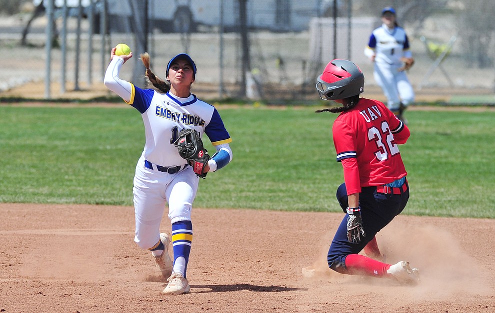 Embry Riddle's Elyssa Bramer tries to turn the double play as the Eagles take on the University of Antelope Valley Pioneer's for the first game of a softball doubleheader in Prescott Friday, April 5. The Eagles won the game 2-0. (Les Stukenberg/Courier)