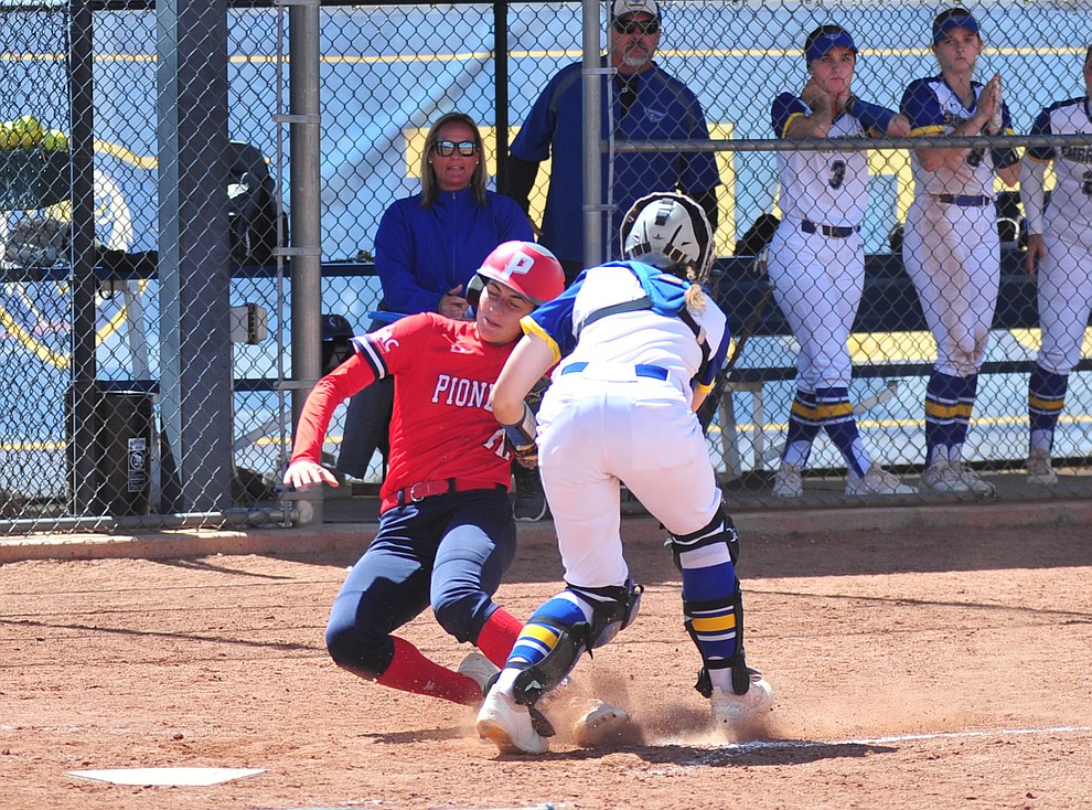Embry Riddle's Haley Basye tags out Kathy Perscheid as the Eagles take on the University of Antelope Valley Pioneer's for the first game of a softball doubleheader in Prescott Friday, April 5. The Eagles won the game 2-0. (Les Stukenberg/Courier)