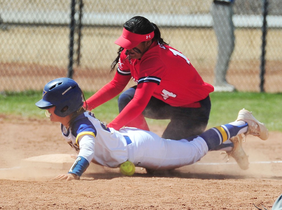 Embry Riddle's Carly Carlsen slides safely into third with a triple as the Eagles take on the University of Antelope Valley Pioneer's for the first game of a softball doubleheader in Prescott Friday, April 5. The Eagles won the game 2-0. (Les Stukenberg/Courier)
