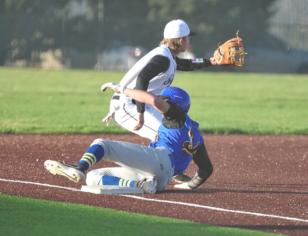 Prescott's Jacob Police slides safely into third with a leadoff triple as the Badgers take on the Bradshaw Mountain Bears in Prescott Valley Tuesday, April 9.  (Les Stukenberg/Courier)