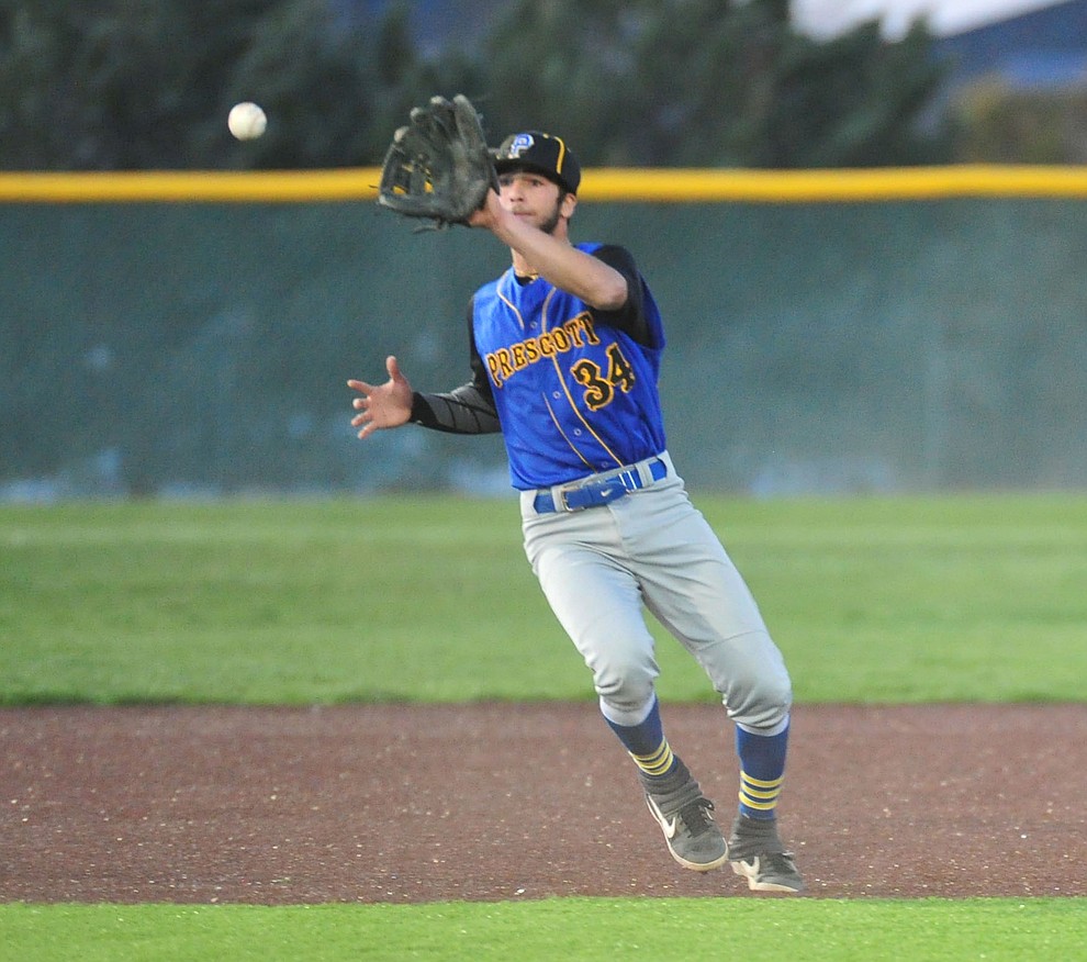 Prescott's Jacob Police makes the play at third as the Badgers take on the Bradshaw Mountain Bears in Prescott Valley Tuesday, April 9.  (Les Stukenberg/Courier)
