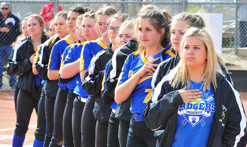 Prescott's players stand for the National Anthem as the Badgers play the Bradshaw Mountain Bears Thursday, April 11 in Prescott Valley. (Les Stukenberg/Courier)