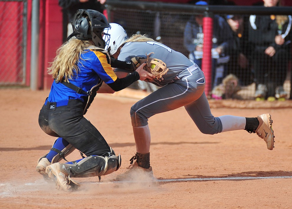 Prescott's Danner Cozens tags Kassidy Outlaw out as the Badgers play the Bradshaw Mountain Bears Thursday, April 11 in Prescott Valley. (Les Stukenberg/Courier)