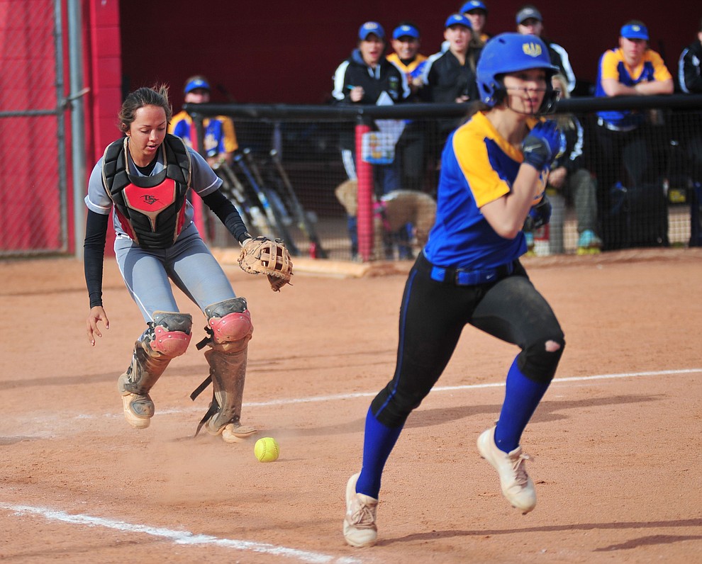Bradshaw Mountain's Layla Stouder goes for a bunted ball as the Bears host the Prescott Badgers Thursday, April 11 in Prescott Valley. (Les Stukenberg/Courier)