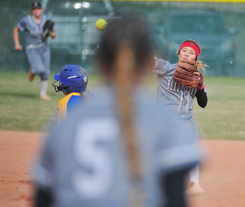 Bradshaw Mountain's Shelby Dilcher tries to turn the double play as the Bears host the Prescott Badgers Thursday, April 11 in Prescott Valley. (Les Stukenberg/Courier)