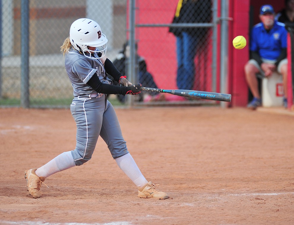 Bradshaw Mountain's Shelby Dilcher hits the walkoff single to shallow left field as the Bears host the Prescott Badgers Thursday, April 11 in Prescott Valley. (Les Stukenberg/Courier)